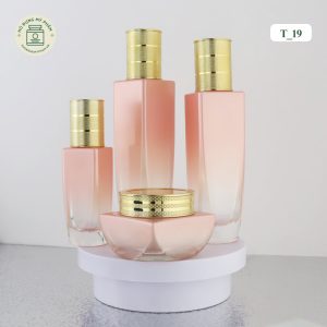 Trọn bộ vỏ chai lọ mỹ phẩm thủy tinh màu hồng cam thiết kế sang trọng đẳng cấp mã T19